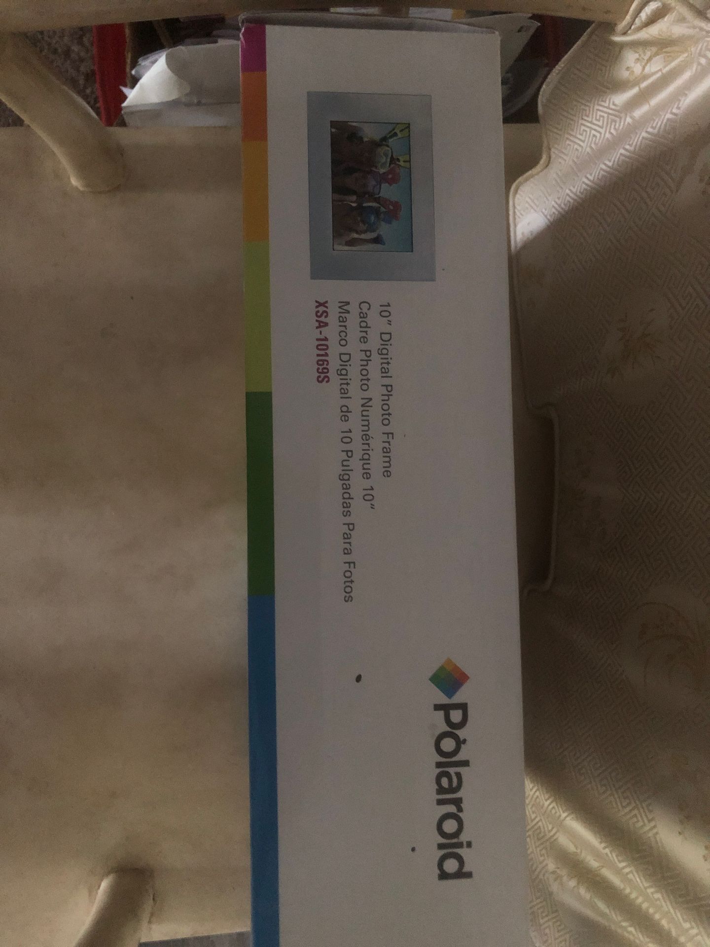 Brand new Polaroid 10 inch digital photo frame. you pay for shipping $15.00