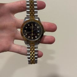 Rolex ($200)