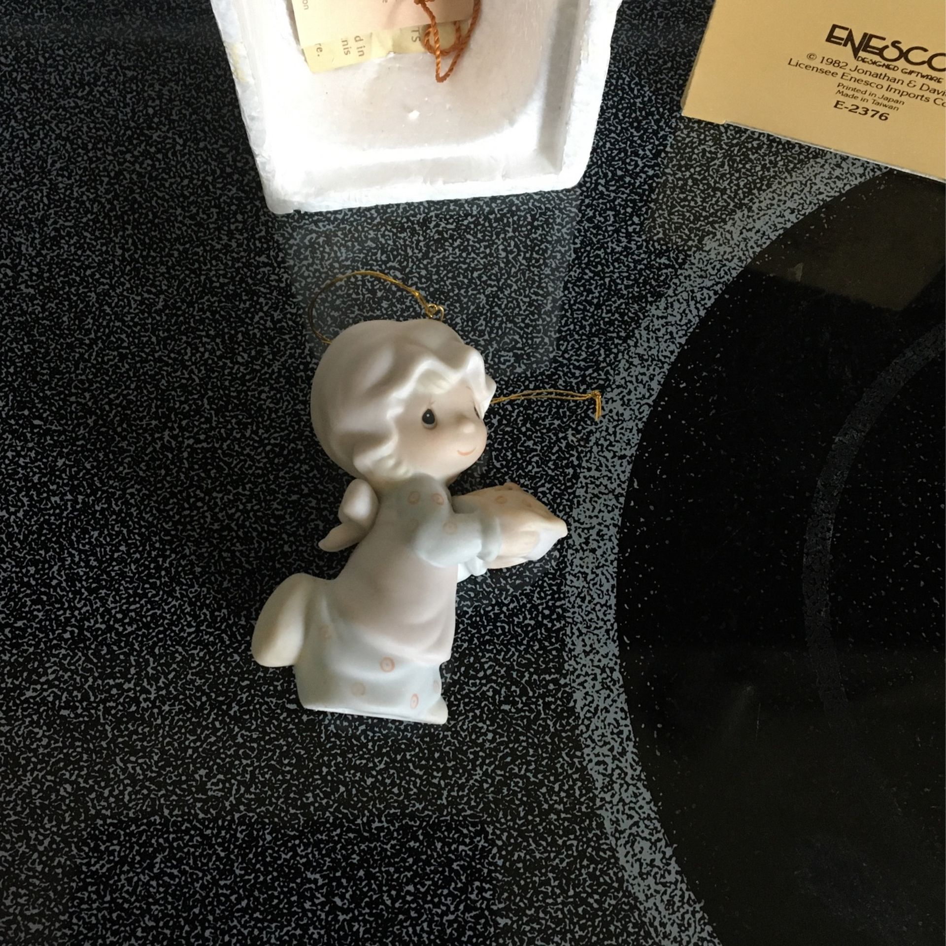 Precious moments ornament dropping over for Christmas