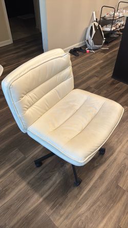 Beige office chair with slight wear