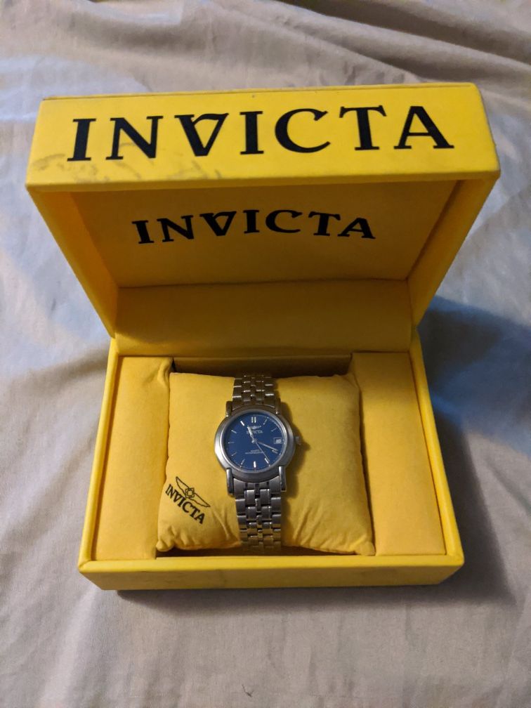 Men's Silver Tone Invicta Wrist Watch W/ Date Window Blue Face Water Resistant