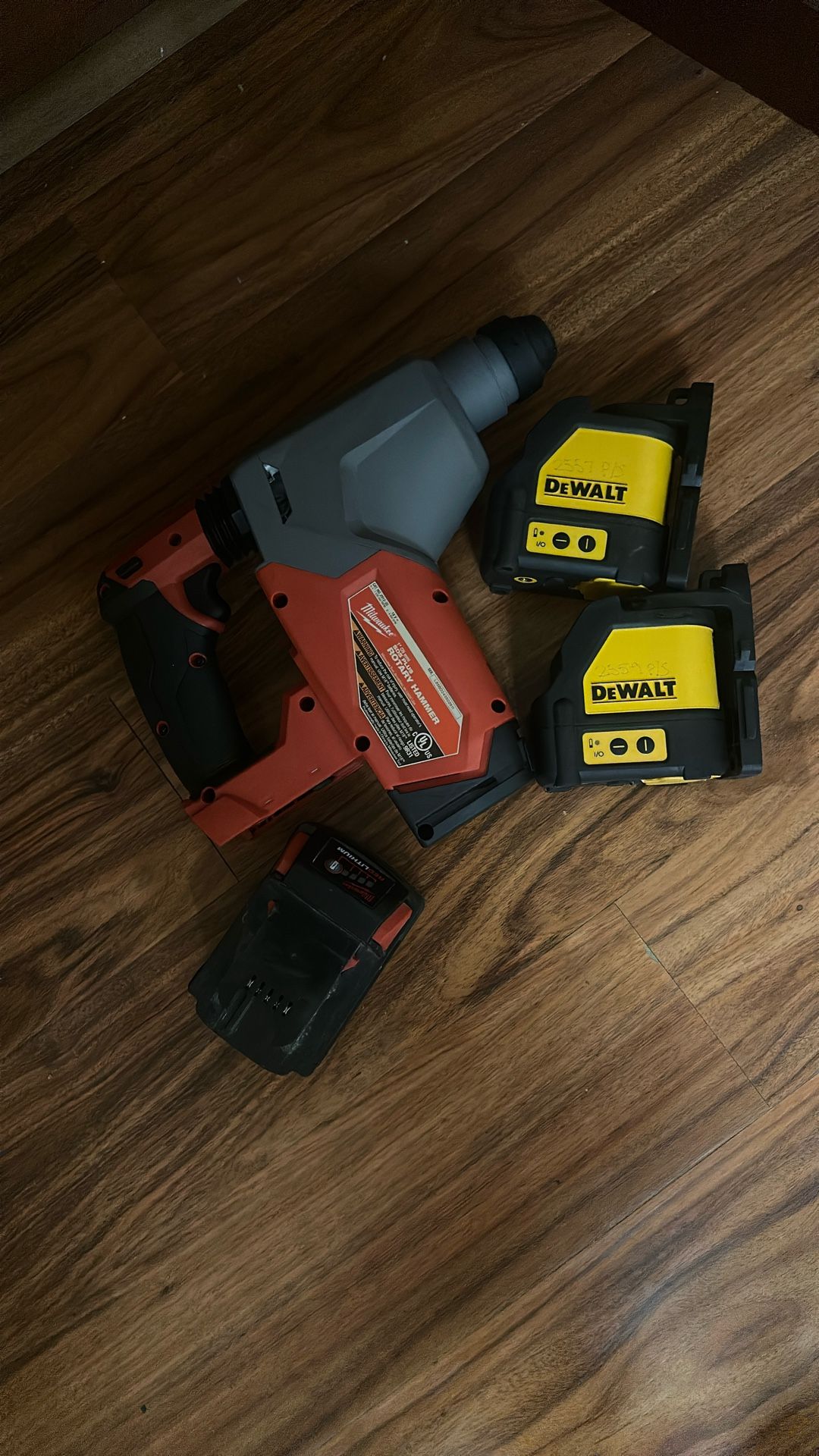 Hammer drill and two lasers
