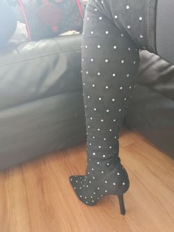 Black thigh high boots