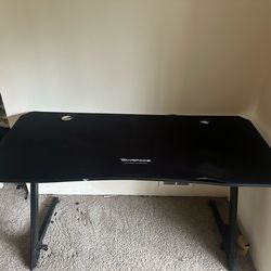 Gaming desk with mouse pad
