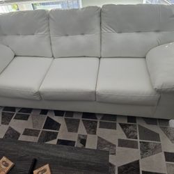 Almost New WHITE LEATHER SOFA