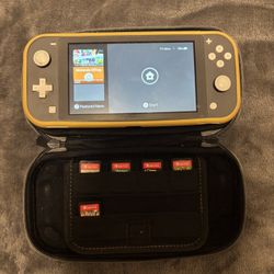 Nintendo Switch Lite With Case, Games, And Charger