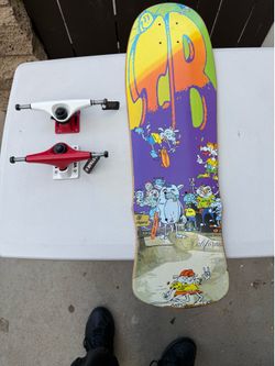 Ollie Angel IB skateboard deck with vision stage XI trucks