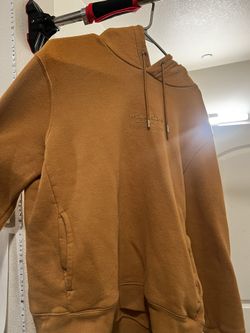 Tan/orangish Hoodie Size Medium. 