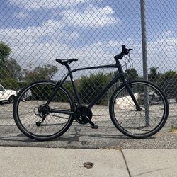 Giant Escape 3 Hybrid Bike, 29 Inch 700c Tires With A Matte Black Frame