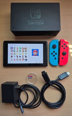 Nintendo Switch V1 with 128GB SD Card, Dock, and charger.
