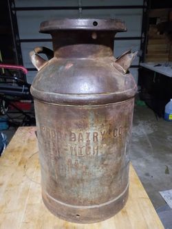 Dairy product , vintage milk can