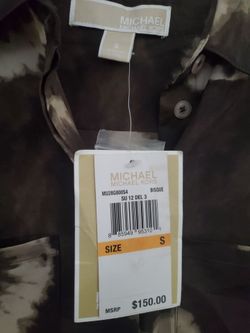 See 2 pictures  New designer dress size Small