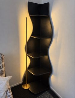 Curvy Black wood style bookshelf