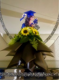 Grad dolls and leis