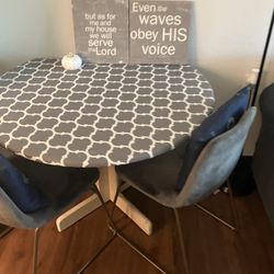 Dining table and two chair chairs