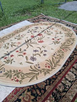 LOTS OF VERY NICE 5 BY 7 AREA RUGS