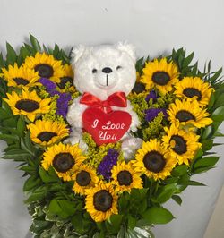 Corazón de girasoles con peluche