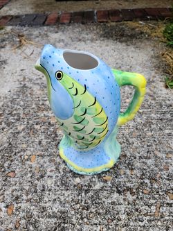 Beautiful fish watering can