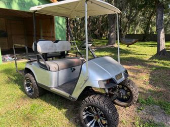EZGO Golf Cart with Lift Kit