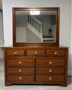 Dresser with mirror and two nightstands