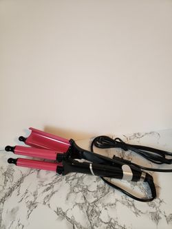 Double barrel curling iron