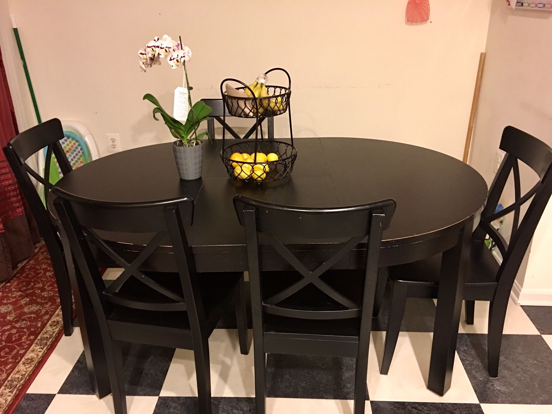 Dark brown wood dining table for sale.