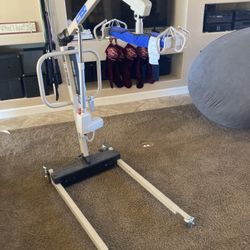 Invacare reliant electric patient lift with manual low base.