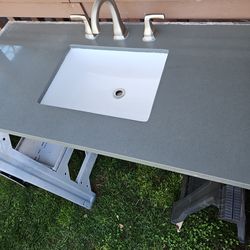Quartz countertop w sink and faucet