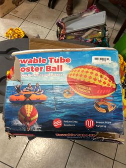 Towable tube booster ball