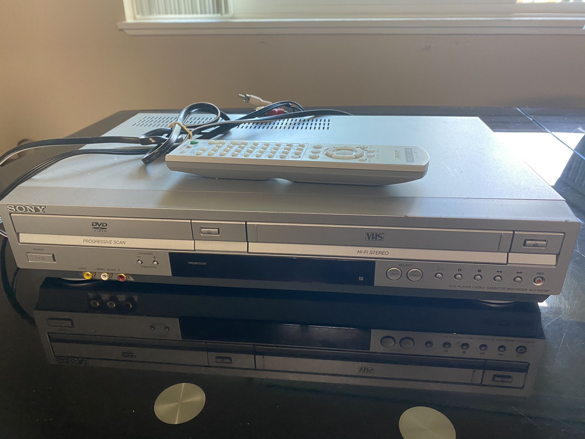 VHS collection + VHS/DVD player combo
