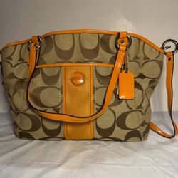 Coach Purse With Pattern In Tan And Brown With Orange Accents