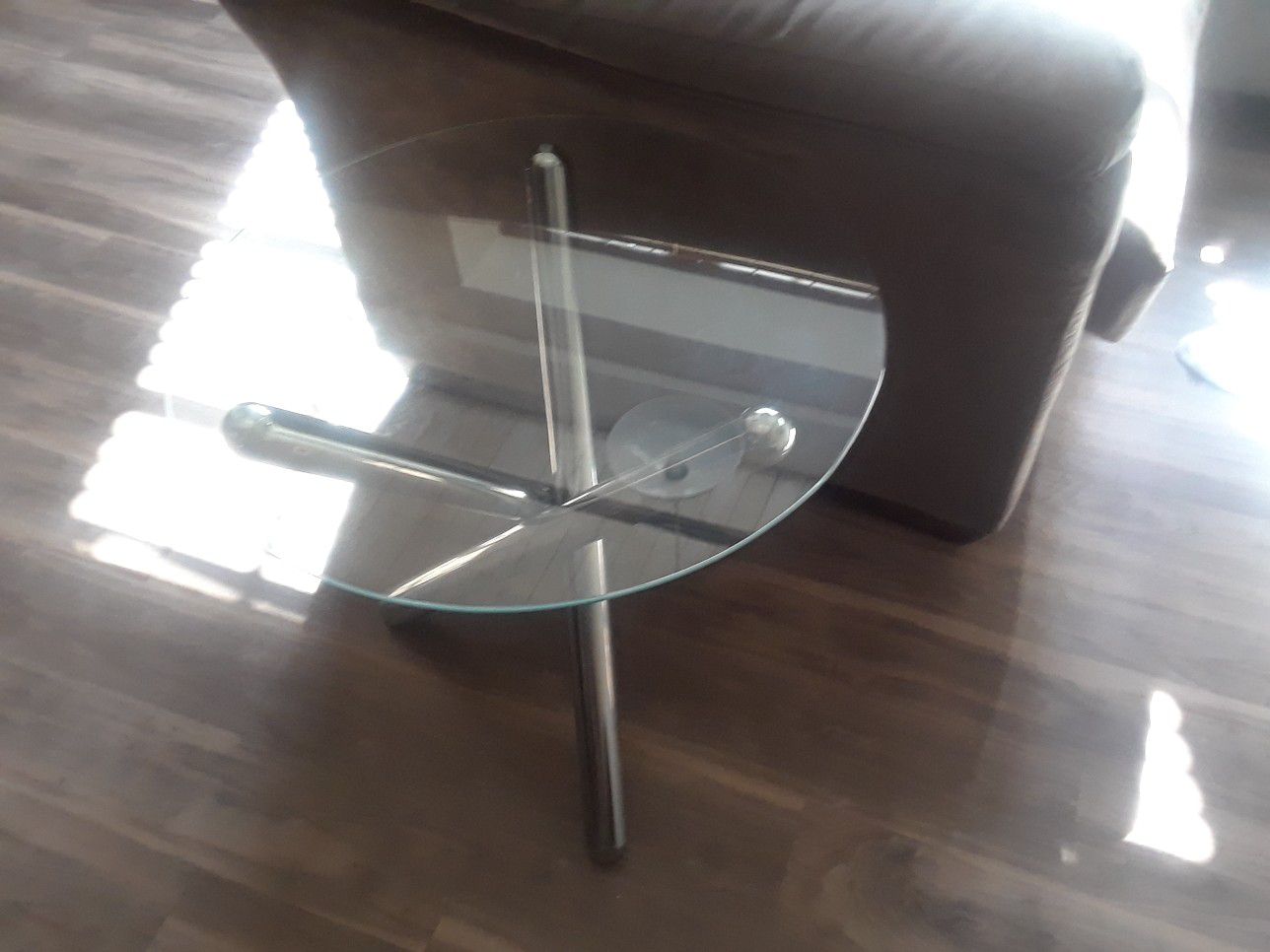 Two small glass end tables