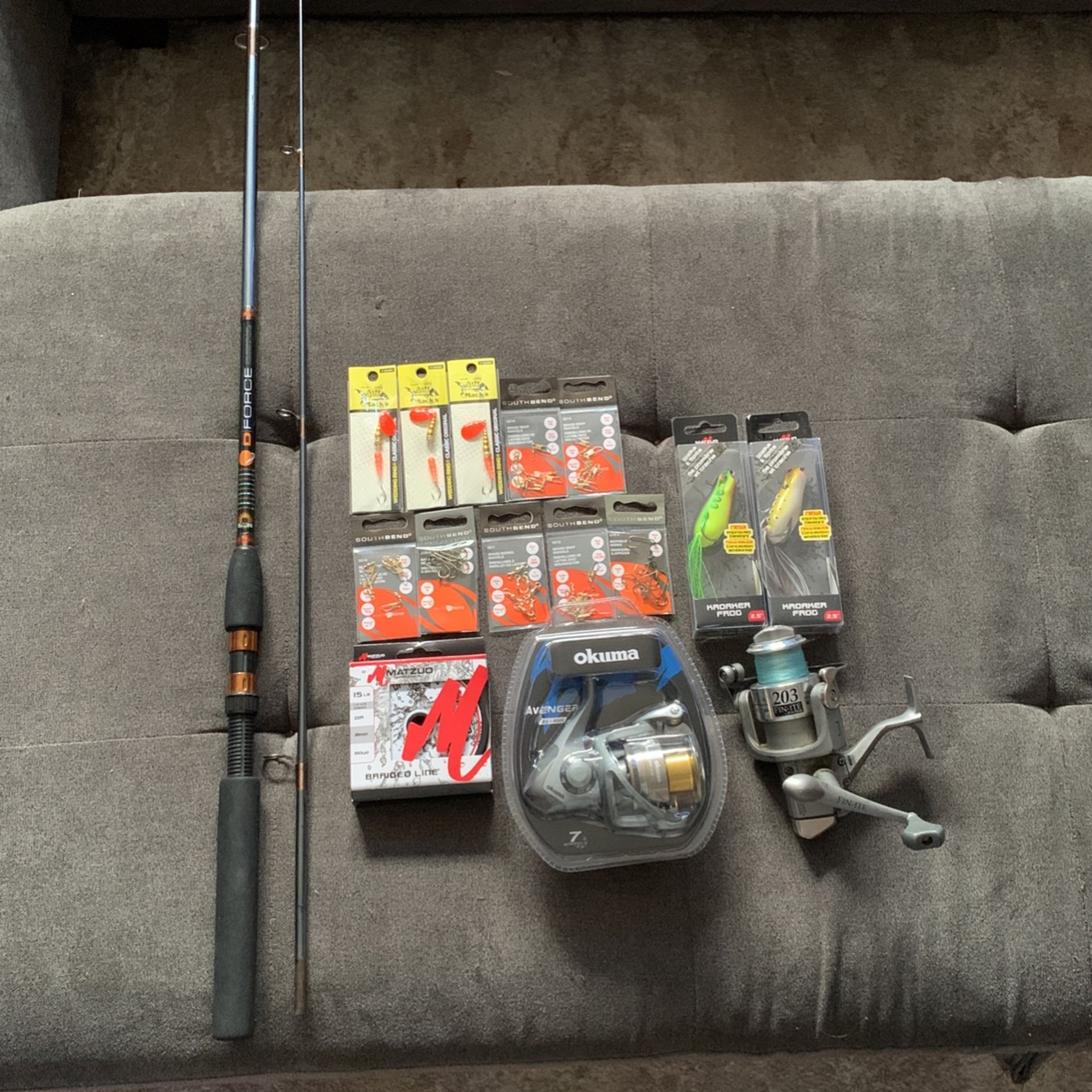 2 Frogs,10 Lewers,15lb Line, Dforce Fishing Rod, 2 Reels, Everything Is Brand New Except The Fishing Rod And The Reel