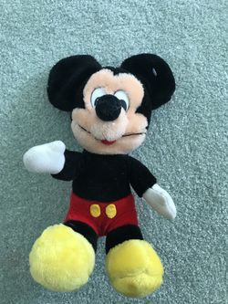 Disney parks 10 inch Mickey Mouse plush stuffed animal.