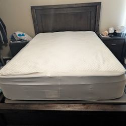 Ashley Queen bed frame & Stearns & Foster Mattress with cover smoke free home no stains. Bed has 2 drawers on each side.
