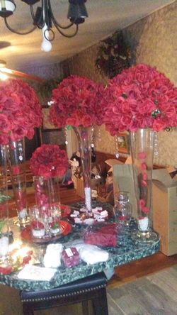 Selling 4 large floral arrangements er 3 foor tall all 4 for $350. Each ask prices on anything in pictures