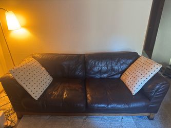 2 brown leather couches