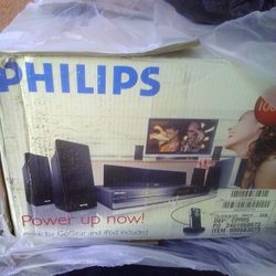 DVD player for sale, complete with speakers and box. 