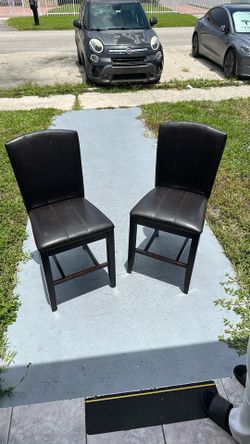 2 BLACK DINE CHAIRS USED $25 EACH