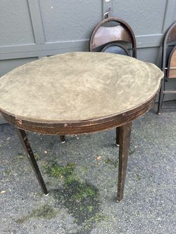 Fold up oak veneer card table and 4 folding chairs…