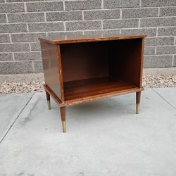 MCM record cabinet with brass tipped pencil legs