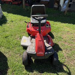 Red Craftsman riding lawnmower