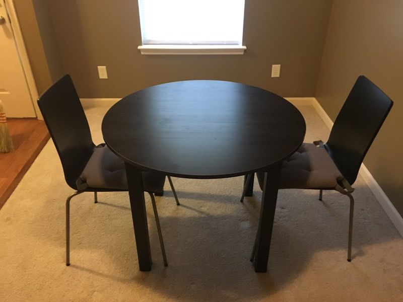 Dining room table with two chairs