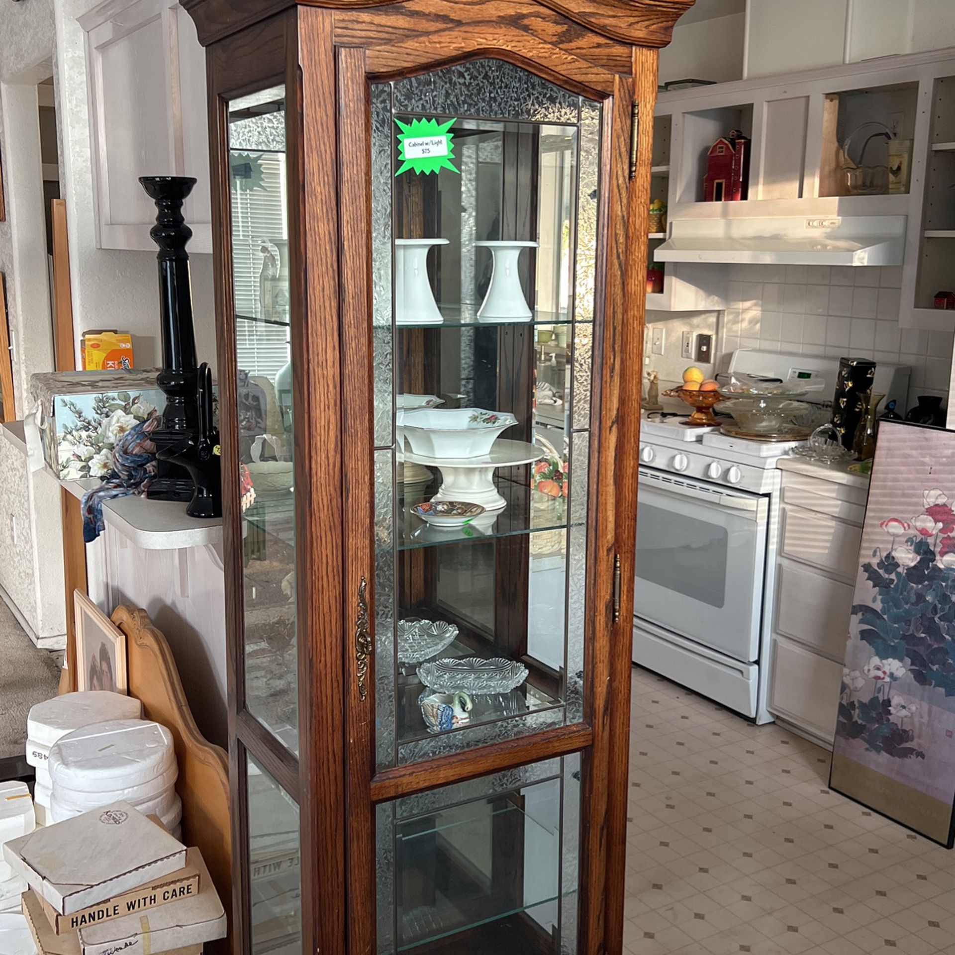 Curio cabinet with glass door and glass shelves