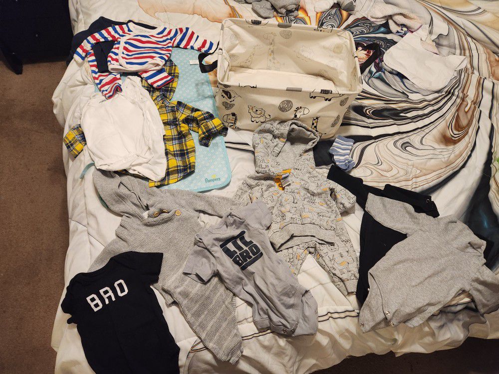 New Baby Clothes in Storage Box 