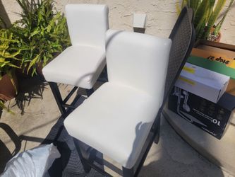 2 WHITE LEATHER STOOLS
