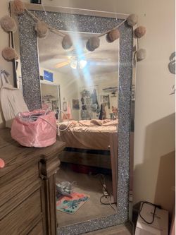 Huge mirrored mirror.