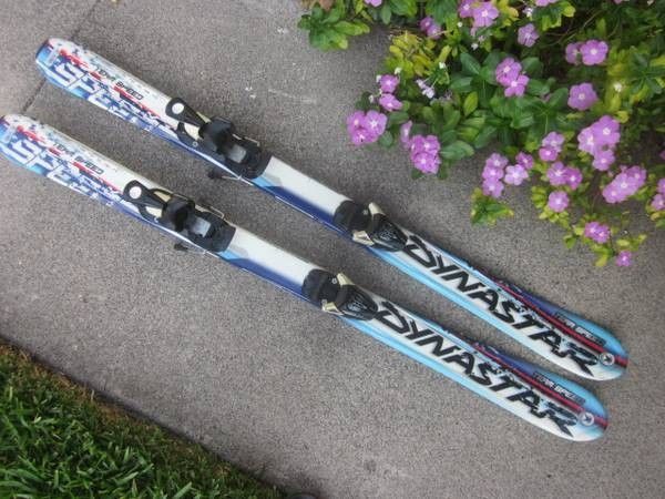 Dynastar 120cm parabolic shaped snow skis, with Salomon adj bindings