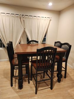 Tall square dining table. 6 Chairs Included