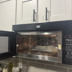 Black Maytag  Microwave Over Stove